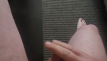 Jerkin While Nude in the Hotel Window.