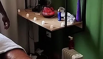 Camera Captures Image of Bear Receiving Massage.