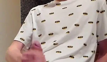 Sweet load of cum flows from this cute guy's big cock
