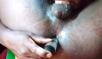 In Africa a Guy Cums While a Toy Is in the Asshole, Pissed Allover His Ass