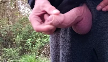 Moaning Squirting Cumshot Wanking in the Woods Wearing Onesie