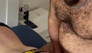 Hairy Bear Top Dominates Jockstrap Bottom in Bed and Sling