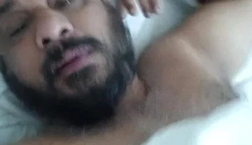Indian Daddy Lying on the Bed Teasing and Posing for You