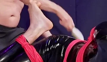 Nicky Roped Ballgagged and Tickled in Latex