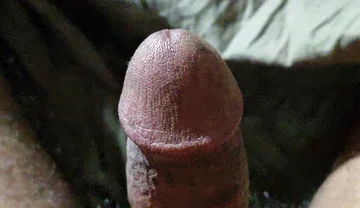 Old Man Playing Cock with Young Boy at Home.