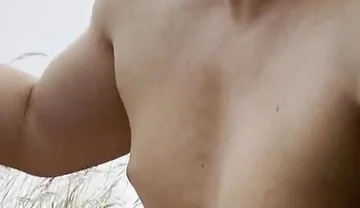 Rain-soaked Rebel: Naked Muscle Stud's Steamy Outdoor Show