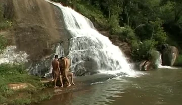 Three Nude in the River