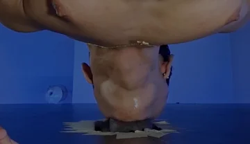 Sucking a Huge Black Cock in a Glory Hole