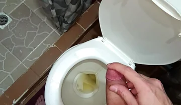 Two Shots of Cum on the Pee in the Bathroom