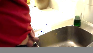 John Is Pissing in the Kitchen Sink