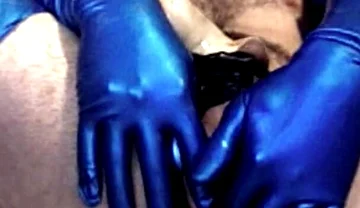 Latex Masked Sub in Stockings Fucks Its Ass with Huge Dildo
