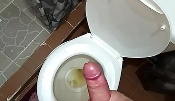 Two Shots of Cum on the Pee in the Bathroom