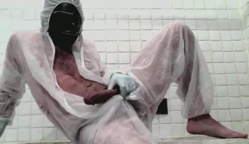 Masked Femboy in Suit Pees Itself and Cums