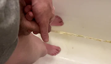 Amateur Boy Pissing, with Close-up and Good Quality Slow Motion of the Load of Pee Coming Out of the Pee-hole (urethra)