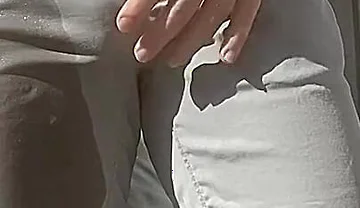 Jules Wets His Grey Pants and Exposes His Semi-hard Cock Through His Trousers