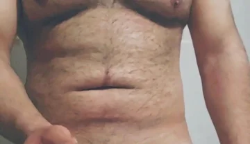 Hairy Big Man Playing with His Dick