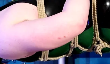 The Chastity Slave Is Bound in Ropes and Tormented with Feet