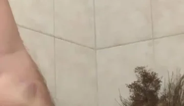 In the bathroom with a beach ball