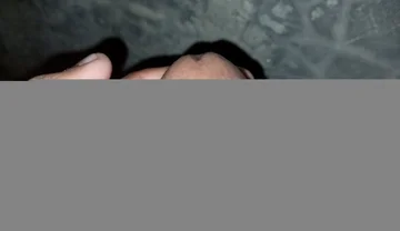 The Gay Boy Went to the Toilet, Turned on the Flash Light on His Mobile Phone, and Started Licking His Private Parts with Spit.