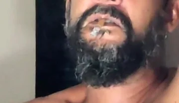 Smoking in Red Underwear