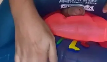 Playing with inflatable swim ring