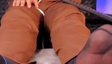 College Teacher Relaxes on the Couch at Home with His Feet on the Furniture so He Can Adore Them