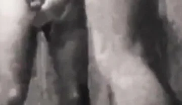 A Boy Is Discussing with His Horny Stepdad in the Pool's Public Showers When Stepdaddy Suddenly Pees on Him