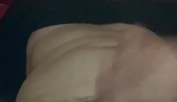 Masturbating