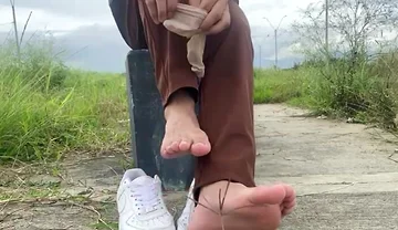 SHE GETS HER SHOES SHAVED IN PUBLIC AND PUTS ON HER SHEER STOCKINGS