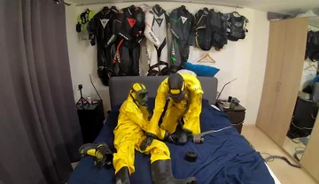 Vacuuming in tellchen hazmat suits