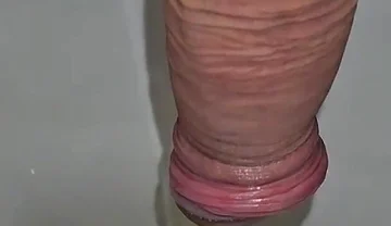 Male Peeing Into the Toilet