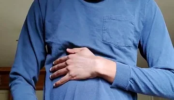 Masturbating