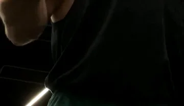 Doing a Biceps Curls with a Straight Barbell