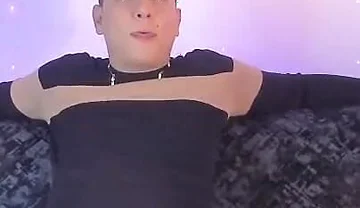 Latino Shows off His Bump on Camera Inside His Gray Sweatshirt