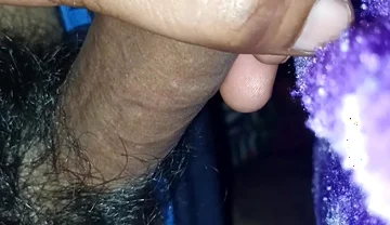 A Indian Young Boy Is Playing with His Penis Inside a Blanket