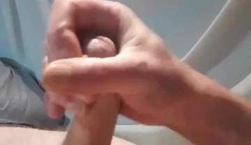 Masturbating