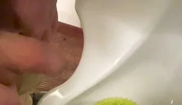 Amateur Redhead Guy Caught Pissing in a Public Toilet's Urinal - He Then Quickly Plays with His Cock Before Leaving