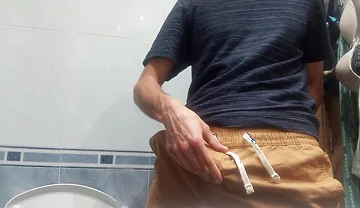 The Guy with the Huge Cock so Fat in His Pants, He Unloads It with 5 Jets of Semen in the Air