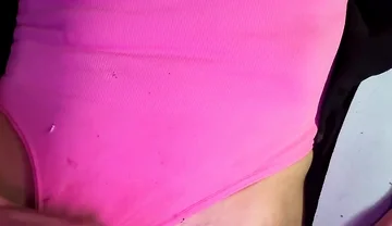 Crossdresser Michelle Wearing Pink Bodysuit While Playing with Cock