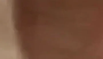 Masturbating