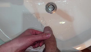Pissing to the Bathroom Sink