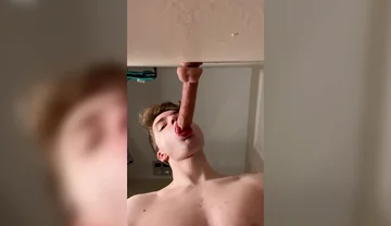 Cock Hungry Twink Slobbers on Giant Dildo!