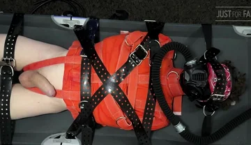 Bondage Twink Strapped to Campbed in Straitjacket and Gas Mask