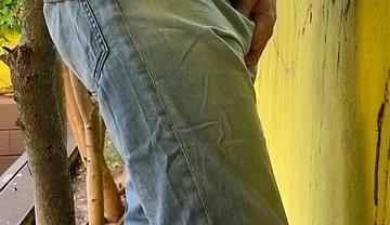 Guy Is Desperate to Pee and Tries to Hide From His Friend but Wets His Pants