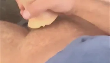 Playing with Toy Under Office Desk