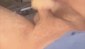 Playing with Toy Under Office Desk