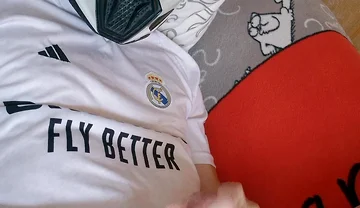 The Guy Is Wearing a Soccer Uniform and Mxhelmet with a Morning Cum