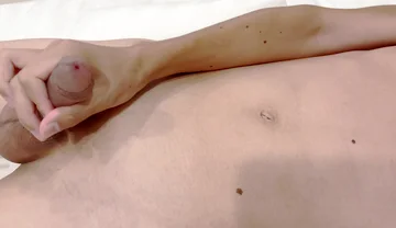A Boy with a Large Foreskin Gets an Erection, Masturbates, and Cums Twice