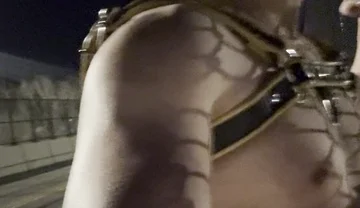 Midnight Muscle Tease: Asian Hunk Flexes Ass & Biceps in Yellow Harness on Highway Bridge