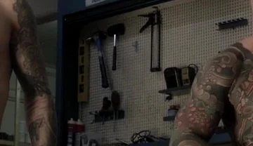 Two Friends in the Mechanic's Workshop